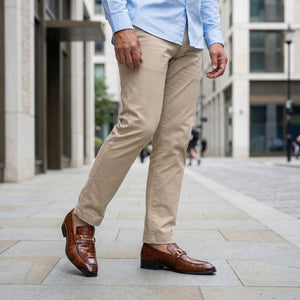 Man wearing brown dress shoes