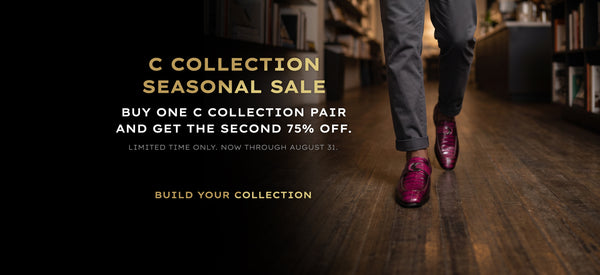 Promotional banner for C Collection featuring a person walking down a wooden hallway wearing gray trousers and shiny magenta shoes, with large text reading 'C COLLECTION SEASONAL SALE' and 'BUY ONE C COLLECTION PAIR AND GET THE SECOND 75% OFF.'.