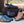 Load image into Gallery viewer, Maurice Embossed Calfskin Slip-On Back-Strap Sandal Blue
