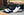 Maurice Embossed Calfskin Slip-On Back-Strap Black/White