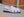 Maurice Embossed Calfskin Slip-On Back-Strap White